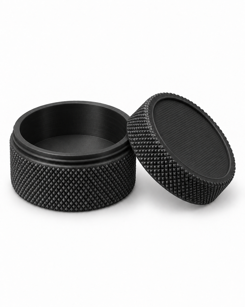 Black 3D-printed small-parts container, open with lid beside it