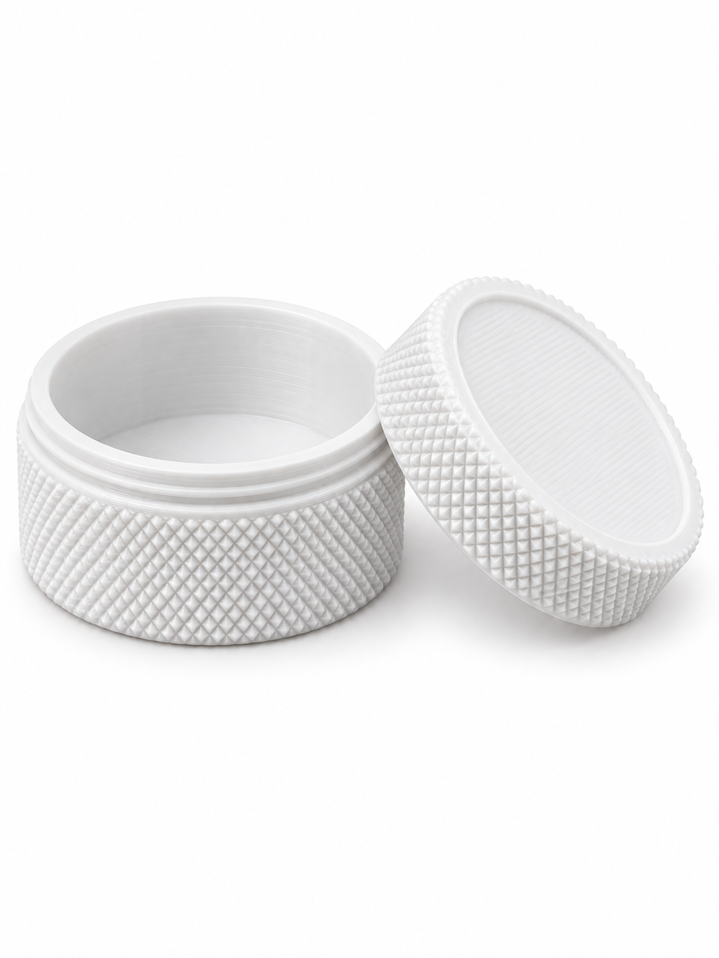 White 3D-printed small-parts container, open with lid beside it