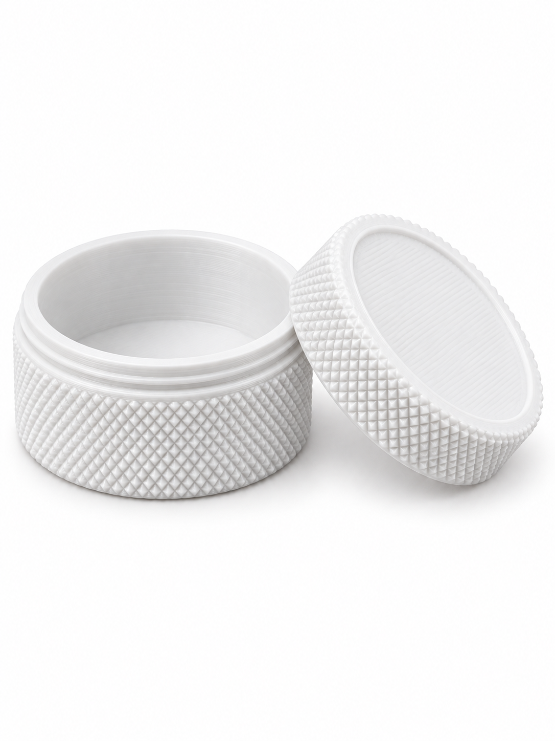 White 3D-printed small-parts container, open with lid beside it
